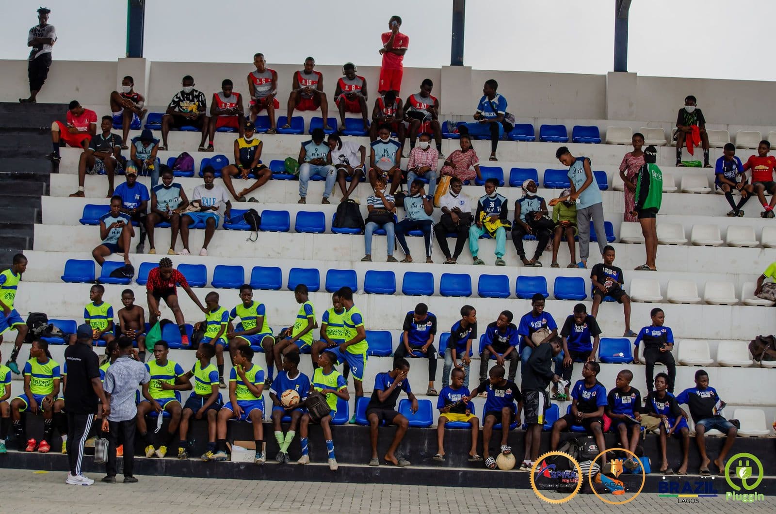 Participants seated in the stands at the YES Camp